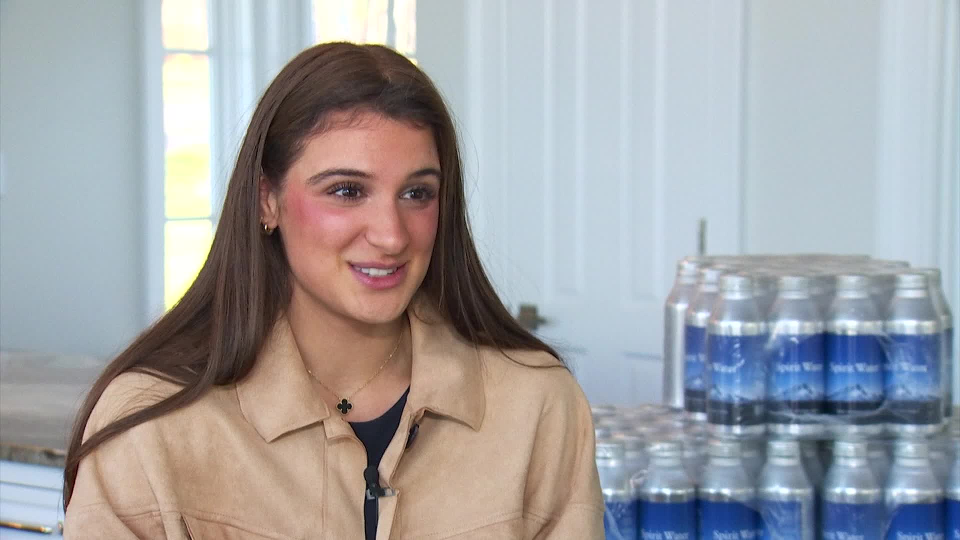 Latham woman finds niche with canned water business