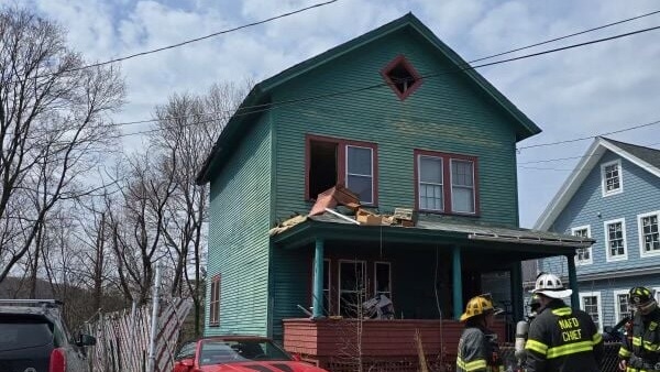 Firefighters respond to a home on Pleasant Street, Friday afternoon.
(The Berkshire Eagle)