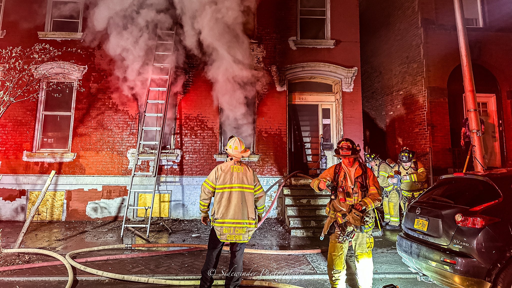 Troy firefighters battle a fire on 2nd Street, Wednesday morning.
(Sidewinder Photography)
