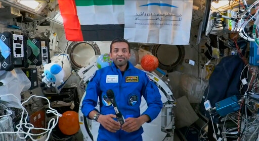 This photo provided by NASA shows Emerati astronaut Sultan al-Neyadi during an interview at the International Space Station on Tuesday, March 7, 2023. The first Arab astronaut assigned to a long spaceflight is still adjusting to life off the planet, five days after rocketing to the International Space Station. (NASA via AP)