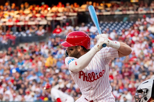 Philadelphia Phillies' Bryce Harper takes an at-bat during the first inning of a baseball game against the San Francisco Giants, Monday, April 14, 2025, in Philadelphia. (AP Photo/Chris Szagola)