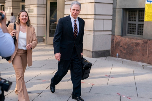 Mark Hansen, right, a lawyer for Meta, departs following the first day of a historic antitrust trial about Meta CEO Mark Zuckerberg intentions in acquiring Instagram, at Barrett Prettyman United States Court House in Washington, Monday, April 14, 2025. (AP Photo/Nathan Howard)